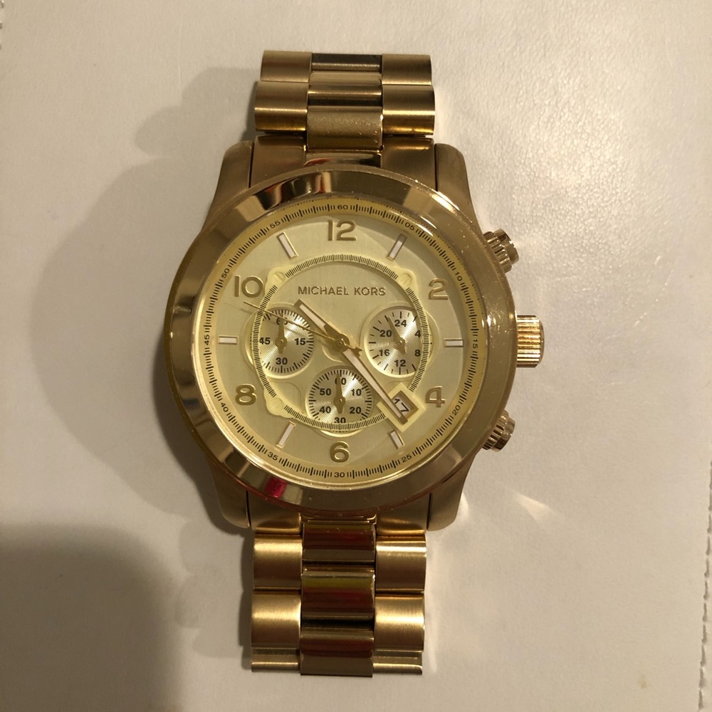 Michael Kors women’s gold watch
